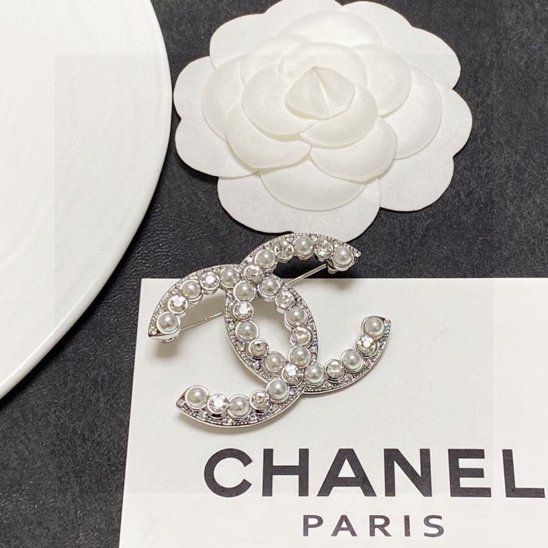 Ch**el brooches